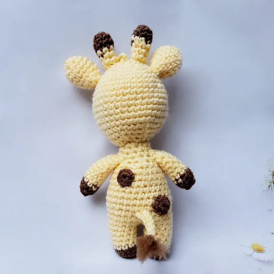 Heegeldatud mänguasi või kotikaunistus kaelkirjak GIIRI